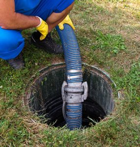 worker providing Sewer Drain Cleaning in Yukon