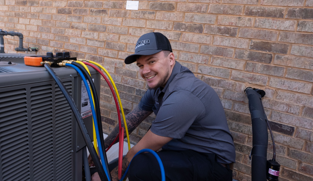 plumber repairing a leaking pipe in Oklahoma City