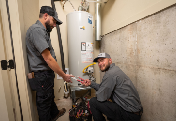 Plumber Fixing Hot Water Tank in Yukon, OK