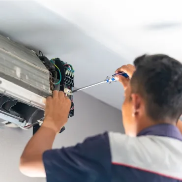 AC Tune Up by Amped Home Services Technician