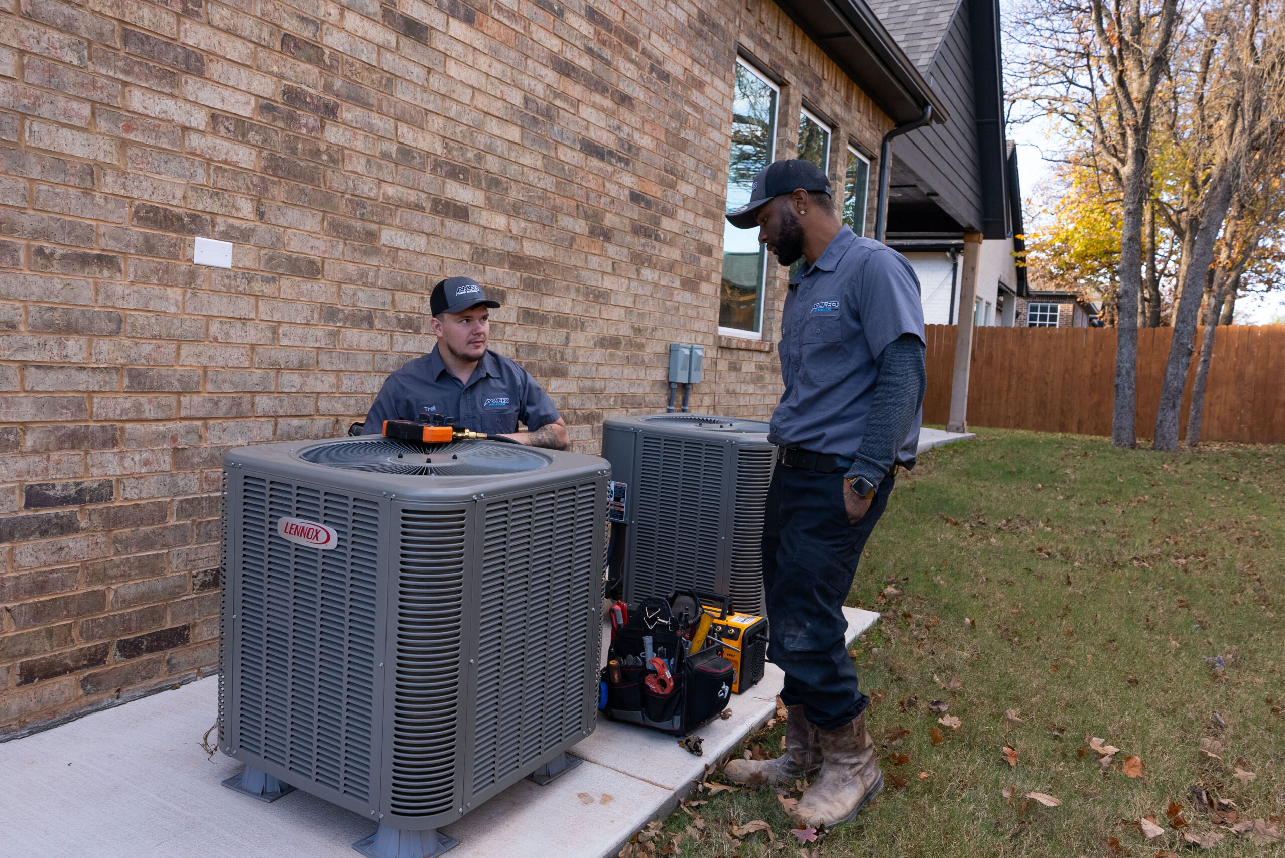 Amped Home Service technician is going through 9 Furnace Tune-Up Signs You Shouldn’t Ignore This Winter.